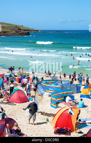 a busy summers day on porthmeor beach, st.ives, cornwall, uk