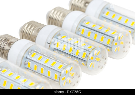 Multiple LED bulbs corn lying side by side on a white background Stock Photo