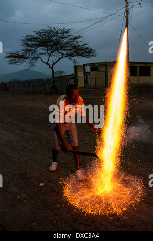 Man lighting fireworks Stock Photo