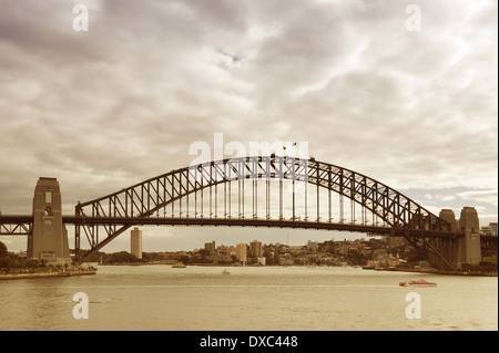 View of the Sydney Harbour Bridge from the sea in retro style Stock Photo