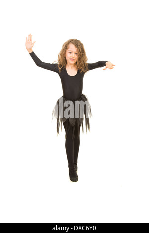 Little girl dancing and make her choreography isolated on white background Stock Photo