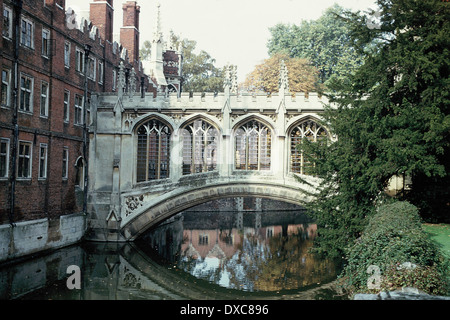 Color/colour photograph of the Bridge of Sighs, St. John's College, Cambridge, England, in autumn, reflected in the water, taken Stock Photo