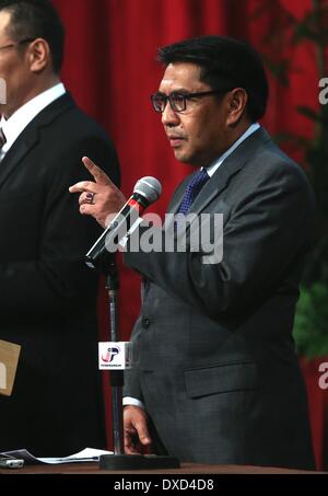 Kuala Lumpur, Malaysia. 24th Mar, 2014. Director General of the Civil Aviation Department (DCA) Azharuddin Abdul Rahman speaks during the press conference in Kuala Lumpur, Malaysia, March 24, 2014. Malaysian Acting Transport Minister Hishammuddin Hussein said here Monday that Australian search aircraft had spotted two objects in the Australian search area, one circular and one rectangular. Credit:  Wang Shen/Xinhua/Alamy Live News Stock Photo