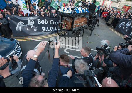 City of London Cemetery and Crematorium, London, UK. 24th March, 2014.  Hundreds of people took part in the funeral procession of Rail, Maritime and Transport (RMT) union leader Bob Crow. The union's general secretary, who led the RMT from 2002, died of a suspected heart attack, aged 52, on 11 March. Credit:  Lee Thomas/Alamy Live News Stock Photo