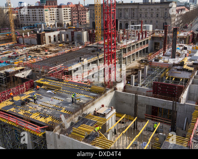 View over a building site - Large-scale inner city centre urban  construction site, constructing new office blocks in Europe Stock Photo