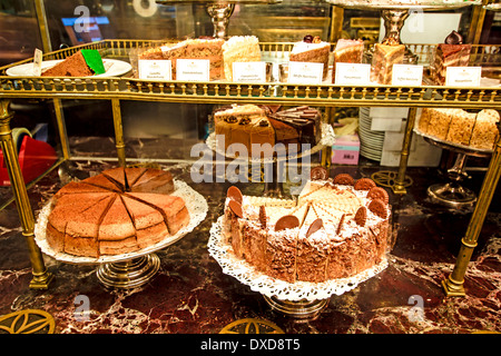 Cakes exposed in the showcase of 'Demel' - the old traditional coffee house in Vienna, Austria. Stock Photo