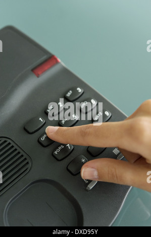 Closeup of woman's hand telephoning Stock Photo