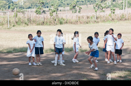 Schoolgirls in Guatemala playing soccer Stock Photo