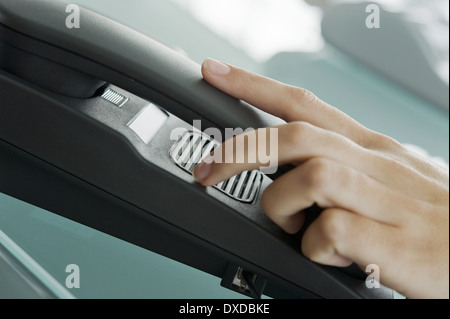 Closeup of woman's hand on telephone Stock Photo