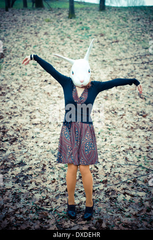 rabbit mask unreal woman at the park Stock Photo