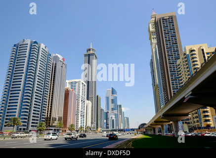 Daytime skyline view along skyscrapers on Sheikh Zayed Road in Dubai United Arab Emirates Stock Photo