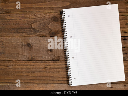 Blank lined notepad, A4 size with space on the left for insertion of your own design elements. Stock Photo