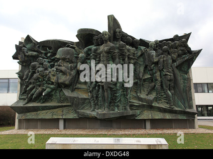 The restored Karl Marx monument 'Aufbruch' (departure). Giant bronze relief from 1974,which once adorned the Leipzig University. Stock Photo