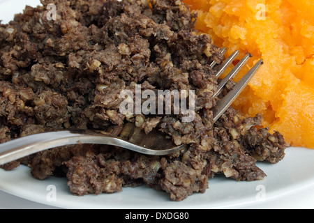 Traditional Scottish haggis and neeps close up, also called a burns supper. Stock Photo