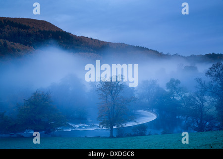 autumn colours and mist in the Dee Valley (Dyffryn Dyfrdwy) at Horseshoe Falls near Llangollen, Denbighshire, Wales Stock Photo