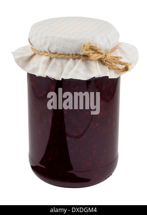 Raspberry jam a popular fruit conserve in a jar with traditional cloth lid isolated against a white background Stock Photo