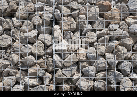 Caged rock riprap in stainless steel frames used as a structural ...