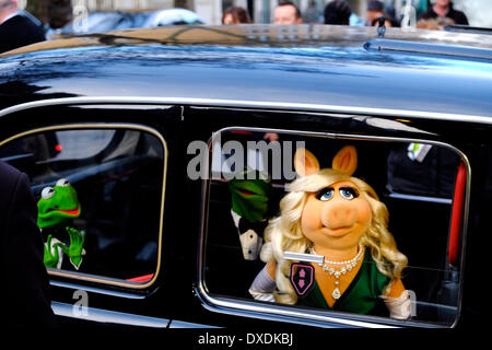 Mayfair, London, UK . 24th Mar, 2014. Constantine, Kermit and Miss Piggy. The stars of 'Muppets Most Wanted' arrive at the Curzon Cinema in Mayfair for a VIP screening. Credit:  Rachel Megawhat/Alamy Live News Stock Photo
