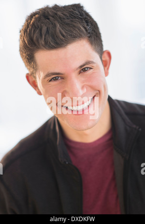 Portrait of smiling young man Stock Photo
