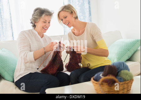 Two mature women knitting Stock Photo