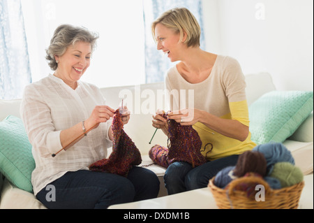 Two mature women knitting Stock Photo