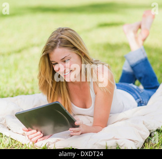 Young woman using digital tablet Stock Photo