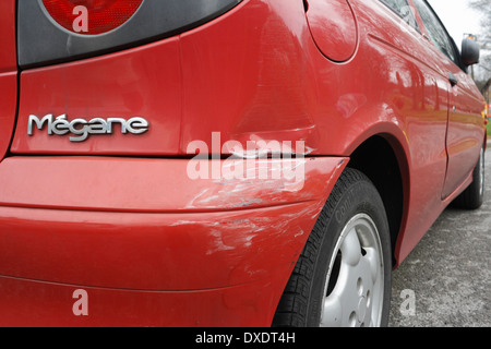 Renault Megane Coupe car bumper and bodywork damage, scratched paintwork on vehicle Stock Photo