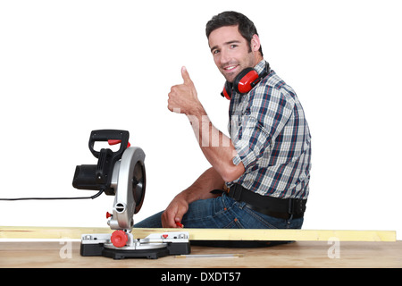 woodworker using circular saw Stock Photo