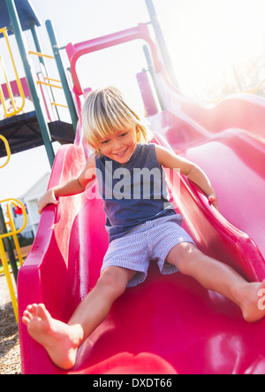 Boy (4-5) playing on playground, Jupiter, Florida, USA Stock Photo