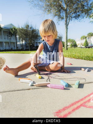 Boy (4-5) playing on playground, Jupiter, Florida, USA Stock Photo