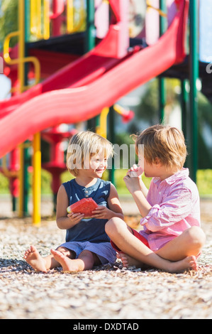 Boys (4-5, 8-9) playing on playground, Jupiter, Florida, USA Stock Photo