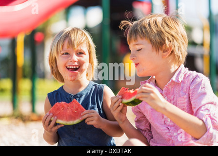 Boys (4-5, 8-9) playing on playground, Jupiter, Florida, USA Stock Photo
