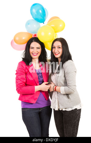 Happy women friends with balloons isolated on white background Stock Photo