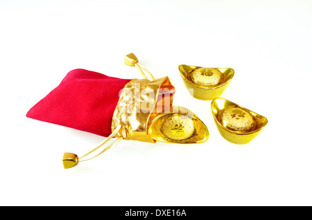 Chinese gold ingots with red packet Stock Photo