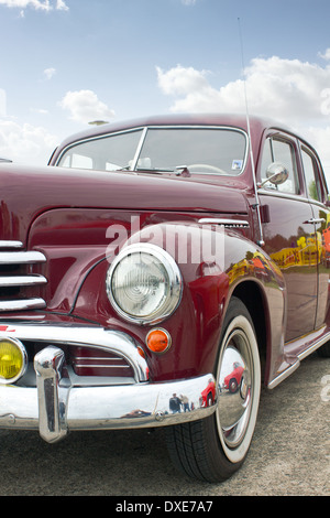 red classic car and blue sky Stock Photo