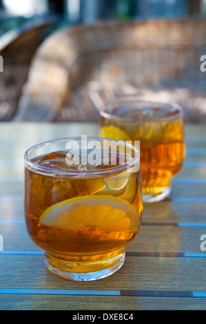 Two glasses of grape juice in a terrace. Stock Photo