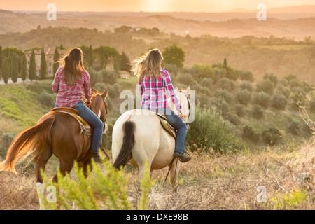 American Quarter Horse. Two riders on a trip in the Toscana, Italy. Toscana, Italy Stock Photo
