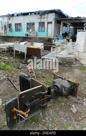 Destroyed buildings after the super typhoon Haiyan on the island leyte,10.03.2014.   Typhoon Haiyan tore through the eastern and central Philippines beginning 08 November 2013 flattening homes toppling power lines and knocking out communications. Photo: Frank May Stock Photo