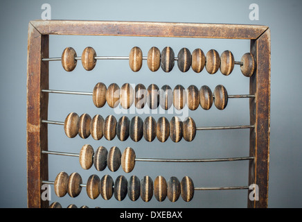 Accounting abacus on gray textured background Stock Photo