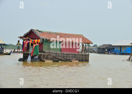 Floating house, part of a large fishing village on Tonle Sap Lake, Cambodia, Southeast Asia Stock Photo