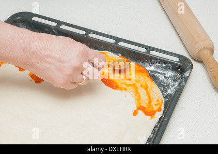 kneading dough for bread on the table Stock Photo