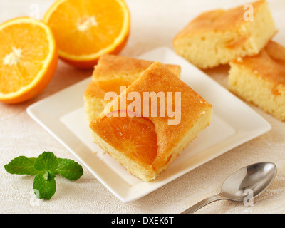 Orange sponge cake. Recipe available. Stock Photo