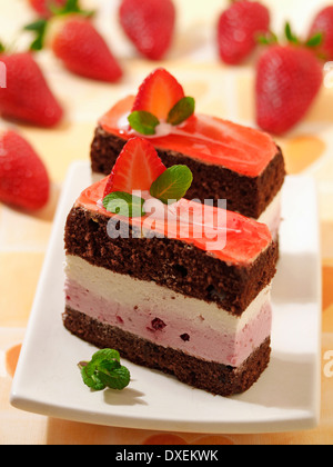 Sponge cake with cream and strawberries. Recipe available. Stock Photo