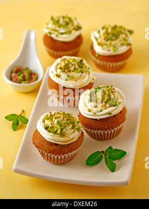 Wholemeal cupcakes with honey and cheese. Recipe available. Stock Photo