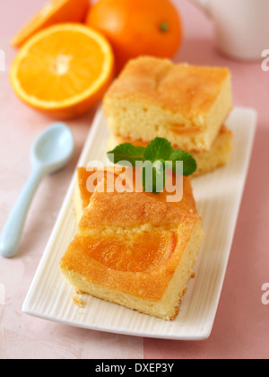 Orange sponge cake. Recipe available. Stock Photo