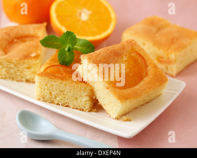 Orange sponge cake. Recipe available. Stock Photo