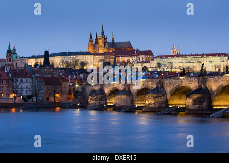 the Castle District, St Vitus Cathedral and the Charles Bridge over the River Vltava at dusk, Prague, Czech Republic