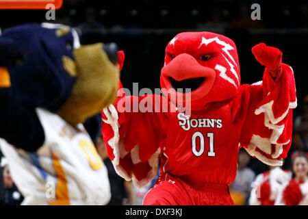 March 24, 2014 - Knoxville, TN, USA - March 24, 2014: St. John's Red Storm mascot performs with Tennessee Lady Volunteers mascot in the first half of an NCAA women's college second-round tournament basketball game Monday, March 24, 2014, in Knoxville, Tenn. (Wade Payne/Cal Sport Media) Stock Photo