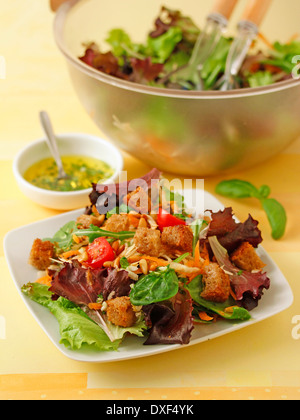 Celeriac salad with pine nuts. Recipe available. Stock Photo