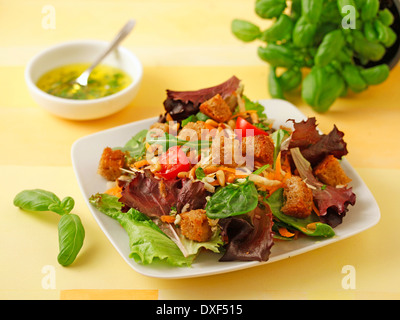 Celeriac salad with pine nuts. Recipe available. Stock Photo